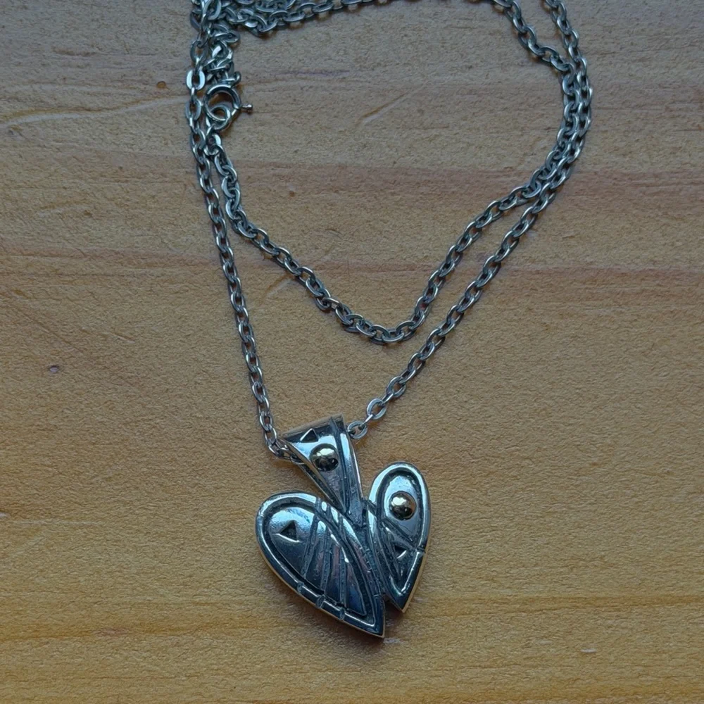 Elegant Silver and Gold Heart Pendant Necklace - Picture 5 of 6
